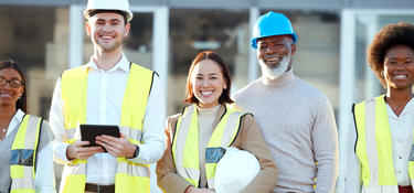 Team members outside a warehouse