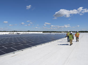 Employees inspect rooftop in Cranbury