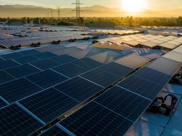 Solar panels on roof during sunset