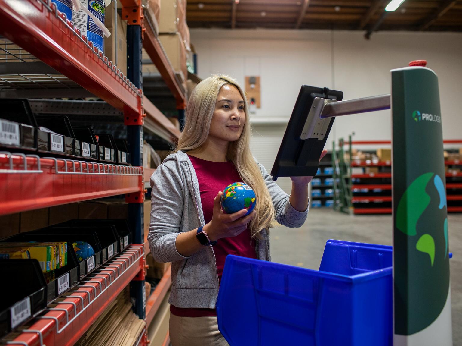 Warehouse worker with autonomous robot